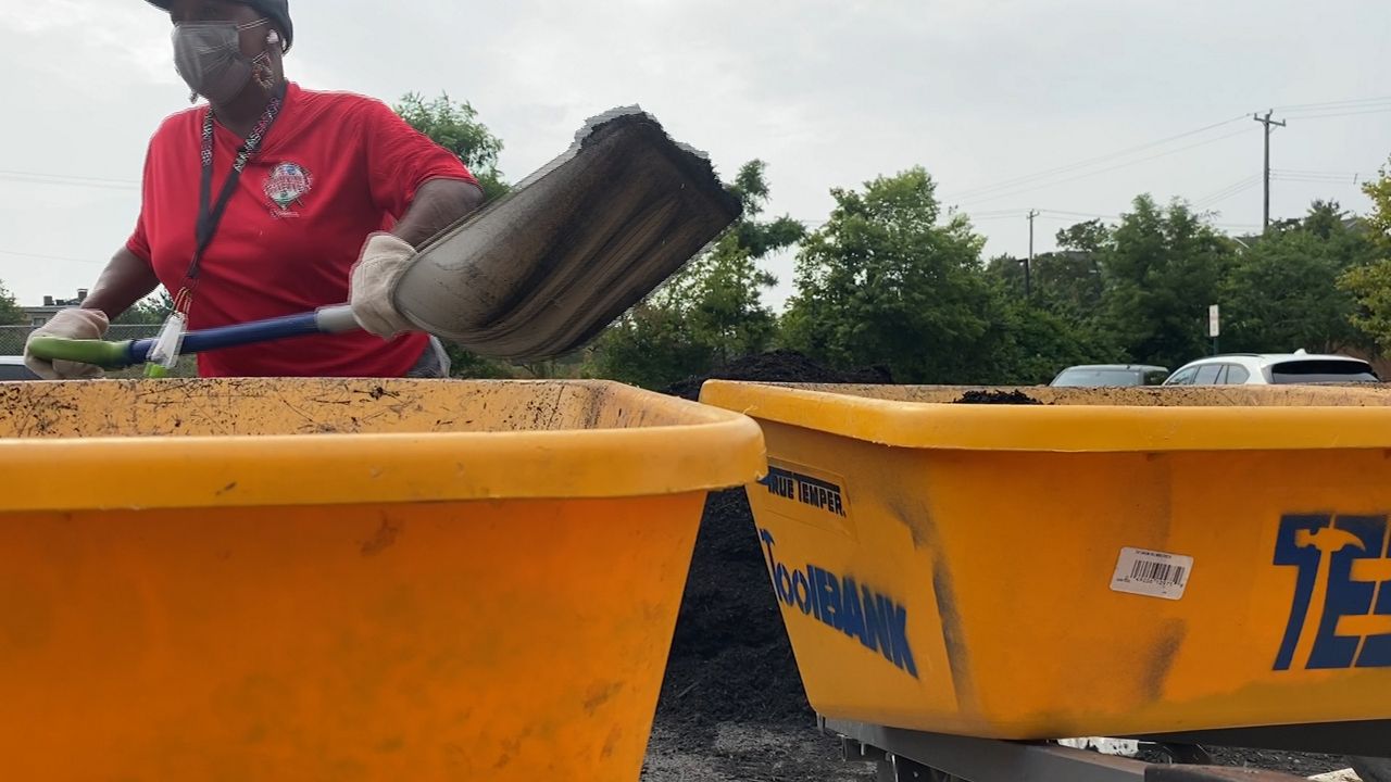 Local companies volunteer for community makeover day