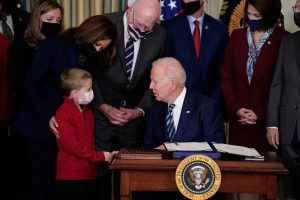 Biden signs three bills benefitting police, first responders: In valor, there is hope