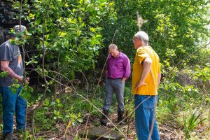 Fisherman finds 240-year-old carved stone on banks of Cuyahoga River