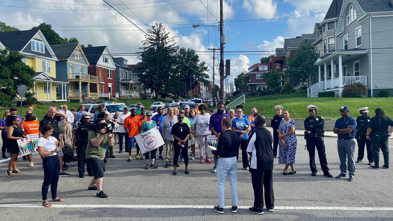 Cincinnatis Evanston neighborhood hosts peace walk against gun violence