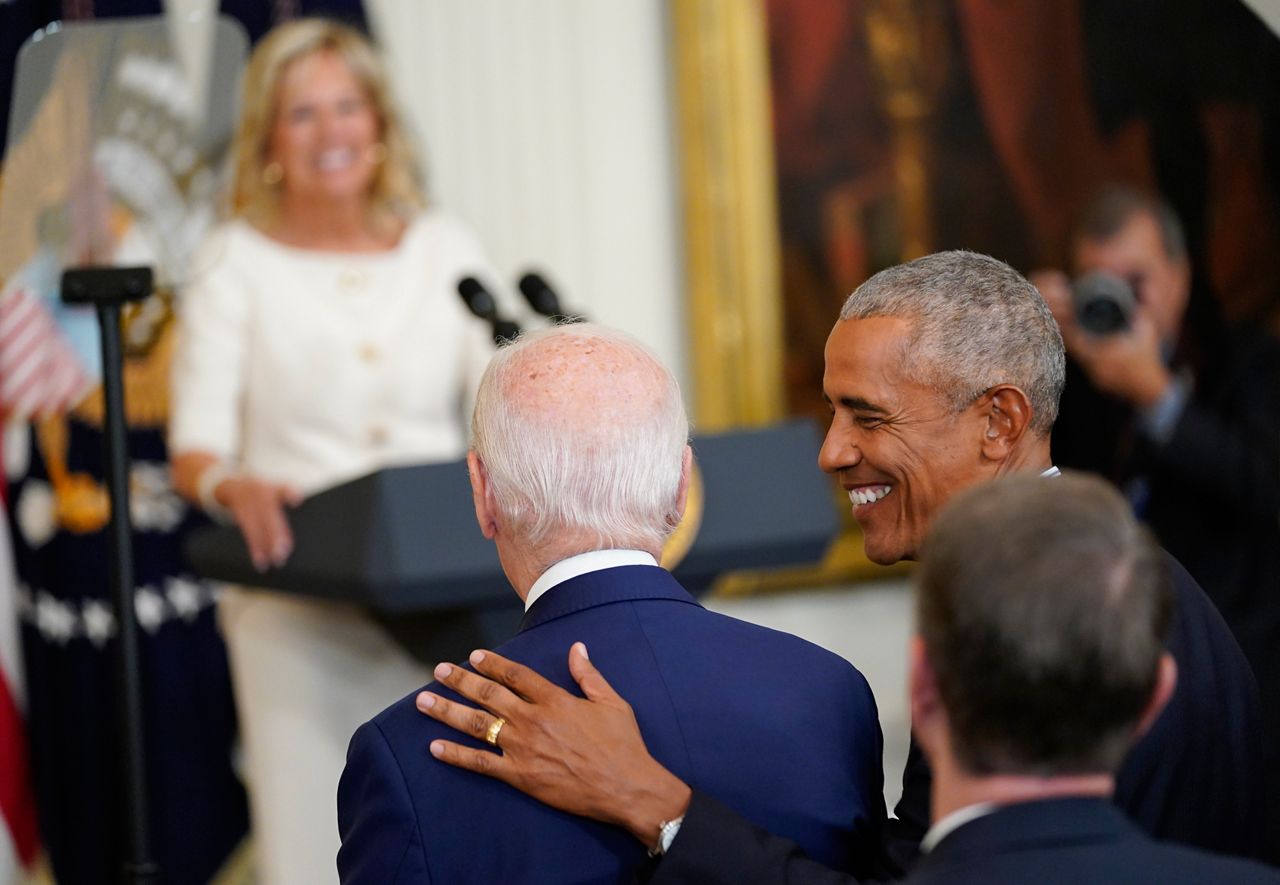 Welcome home: Obamas official portraits unveiled at White House