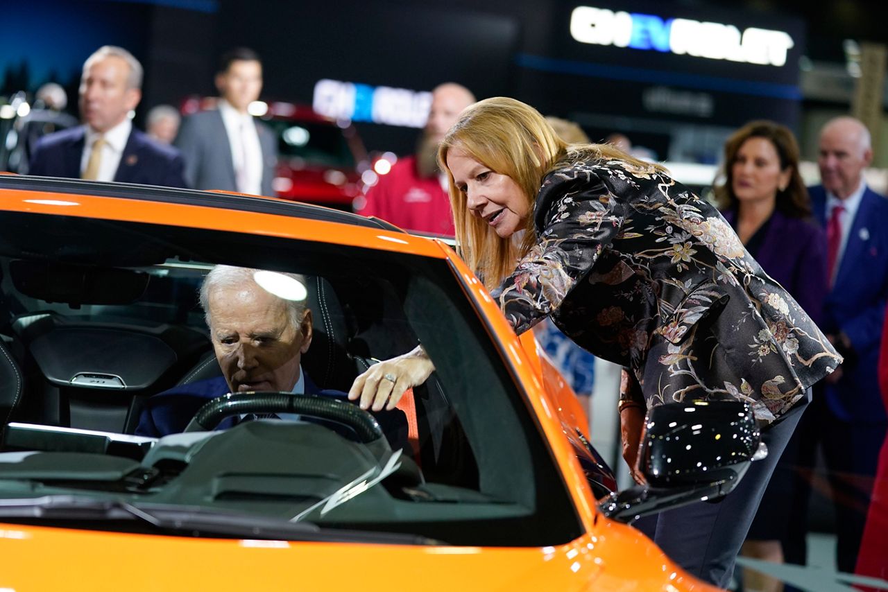 Biden test drives electric cars, announces $900M for charging stations