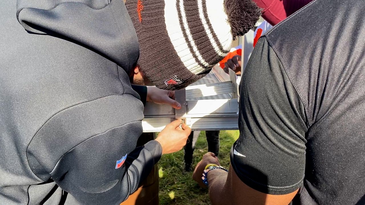 Bengals players come together to a build ramp for local veteran