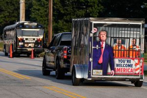 Read more about the article Trump booked, released from jail in Georgia election case